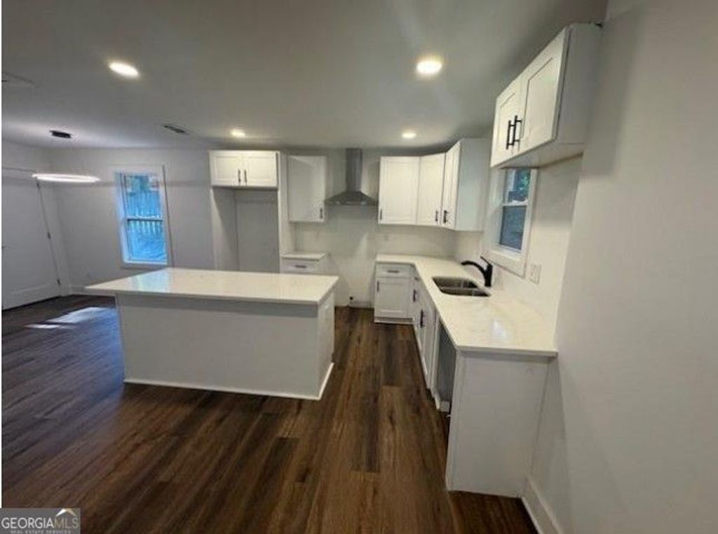 Photo of 2069 W Woodberry Avenue, Atlanta, GA 30344 (MLS # 10678397)