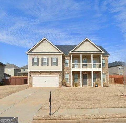 Photo of 325 SAWGRASS Vw, FAIRBURN, GA 30213 (MLS # 10657738)