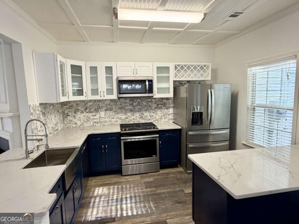 Photo of 10900 Wittenridge Drive #J8, Alpharetta, GA 30022 (MLS # 10738990)