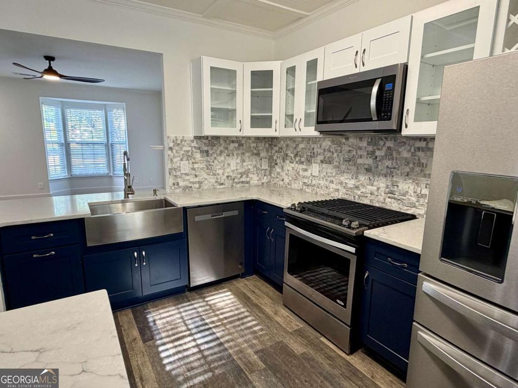 Photo of 10900 Wittenridge Drive #J8, Alpharetta, GA 30022 (MLS # 10738990)