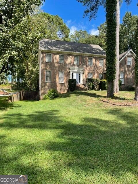 Photo of 5160 Shadow Path Lane SW, Lilburn, GA 30047 (MLS # 10858142)