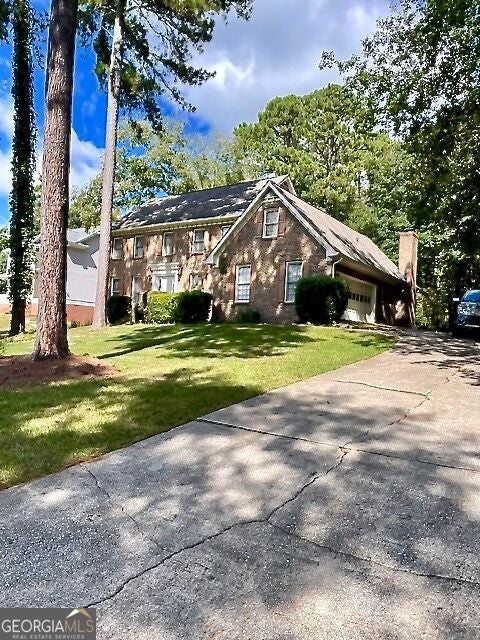 Photo of 5160 Shadow Path Lane SW, Lilburn, GA 30047 (MLS # 10858142)