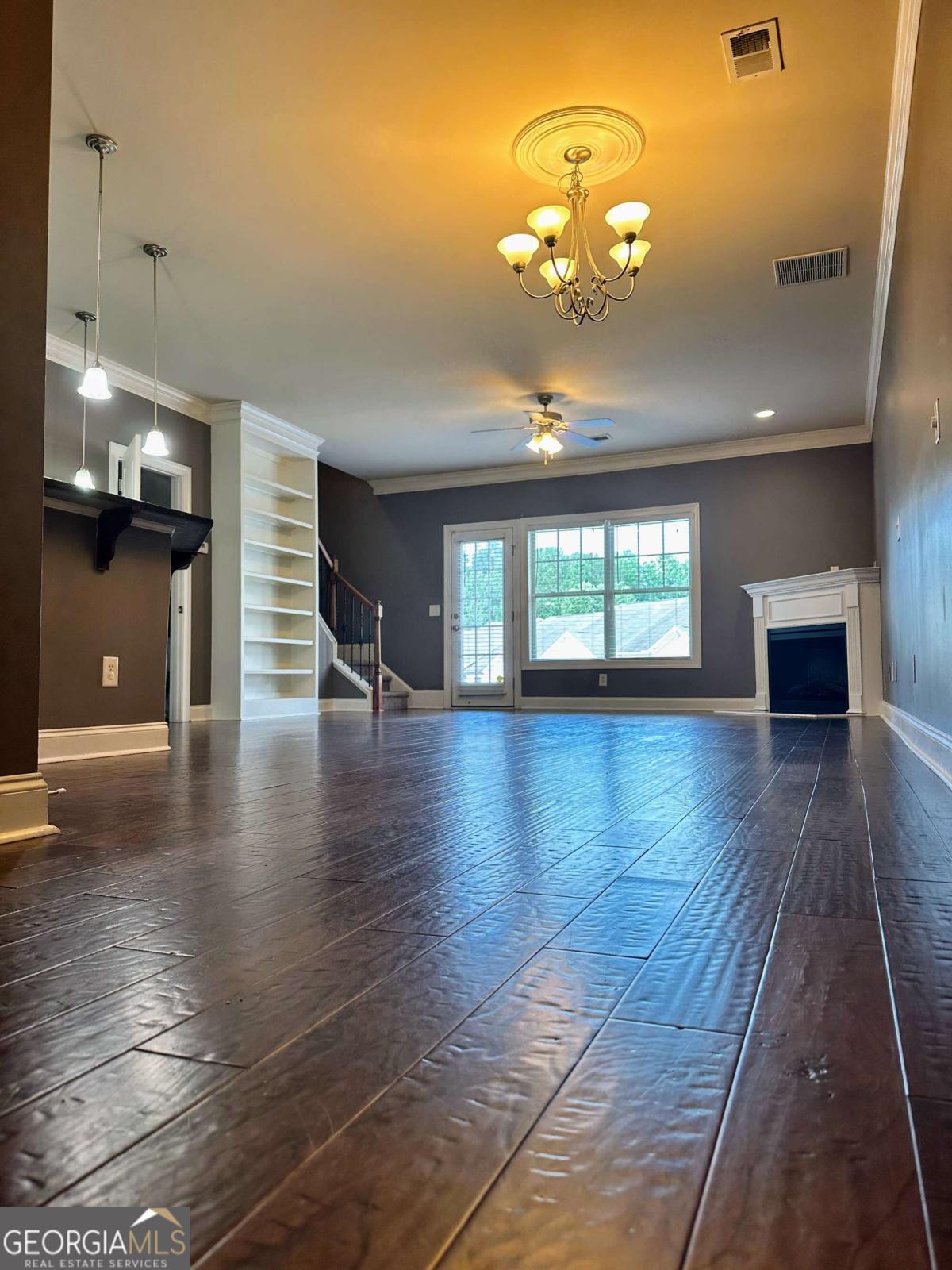 Welcome to Townview Commons, where convenience meets upscale comfort in this beautifully updated 2-bedroom, 2.5-bathroom dual master townhome - perfect for anyone who values smart design and modern amenities. Step inside and enjoy a bright, open layout featuring 9-foot ceilings, gleaming hardwood floors, and an abundance of natural light. The dual master floor plan is ideal for roommates or guests, offering privacy with two spacious bedrooms, each with its own en-suite bath. Key features include, NEW stainless steel refrigerator, all-electric kitchen with granite countertops, microwave, dishwasher, and NEW garbage disposal, washer and dryer included in a dedicated laundry room, electric fireplace for cozy evenings, office/flex space - perfect for remote work, attached 2-car garage, access to a community pool. Located just 10 minutes from Kennesaw State University, major shopping, dining, and I-575 (Exit 7), this townhome offers unbeatable access to everything you need while tucked away in a quiet, well-maintained neighborhood. Water and HOA fees included, Rent is due on the 1st of each month, owner-managed and well-maintained. $2100/month