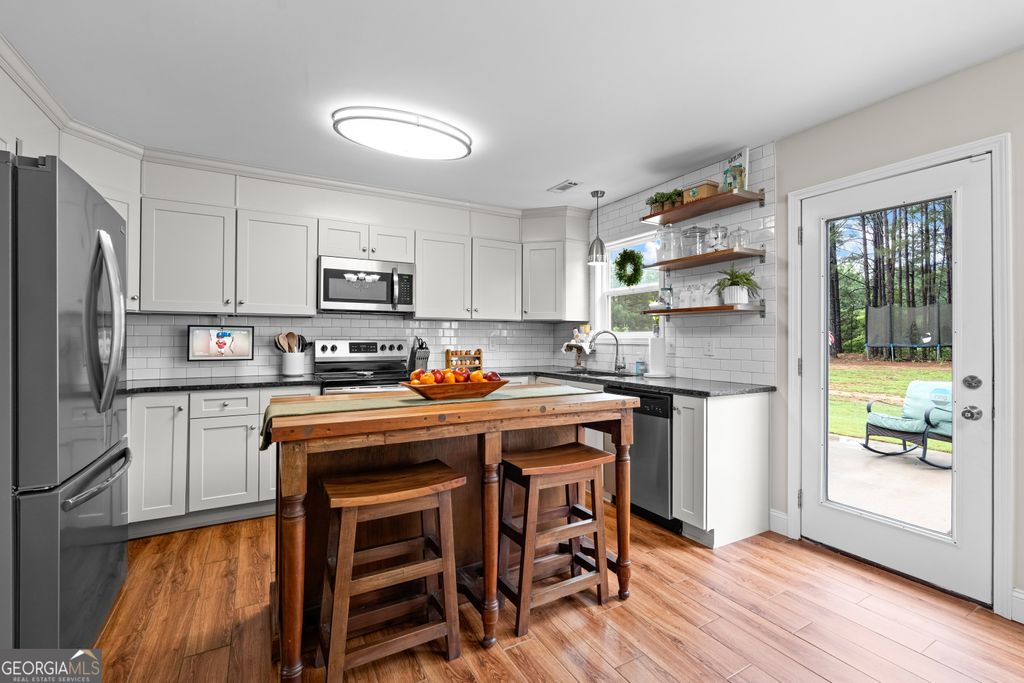 Photo of 234 Emmett Young Road, Grantville, GA 30220 (MLS # 10784931)