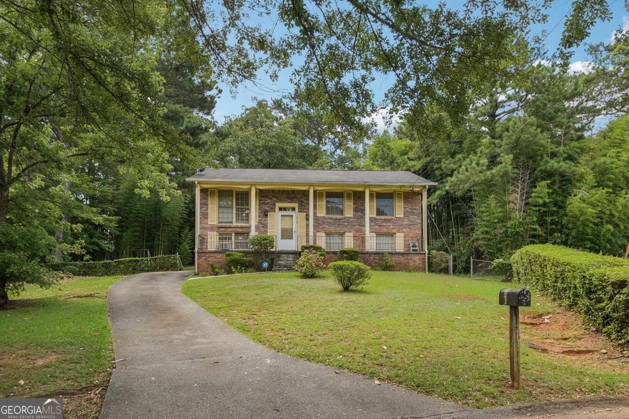 Welcome to 1410 Bronze Leaf Ct - tucked away in a quiet cul-de-sac in the heart of Stone Mountain. This spacious 3-bedroom home sits on a large, private lot and offers incredible potential for customization. The well-designed layout features generous living spaces, perfect for creating your ideal home. Enjoy the bonus of a finished basement complete with a bathroom - perfect for a guest suite, media room, or home office. Step out onto the deck and take in the view of the expansive backyard, ideal for entertaining, gardening, or simply relaxing in your own outdoor retreat. Whether you're a first-time buyer looking to make it your own, or an investor seeking a prime opportunity, this property checks all the boxes. Conveniently located near I-285, you'll have quick access to downtown Atlanta, shopping, parks, and schools. Don't miss out - this is your chance to own a home with great bones in a desirable Stone Mountain location!