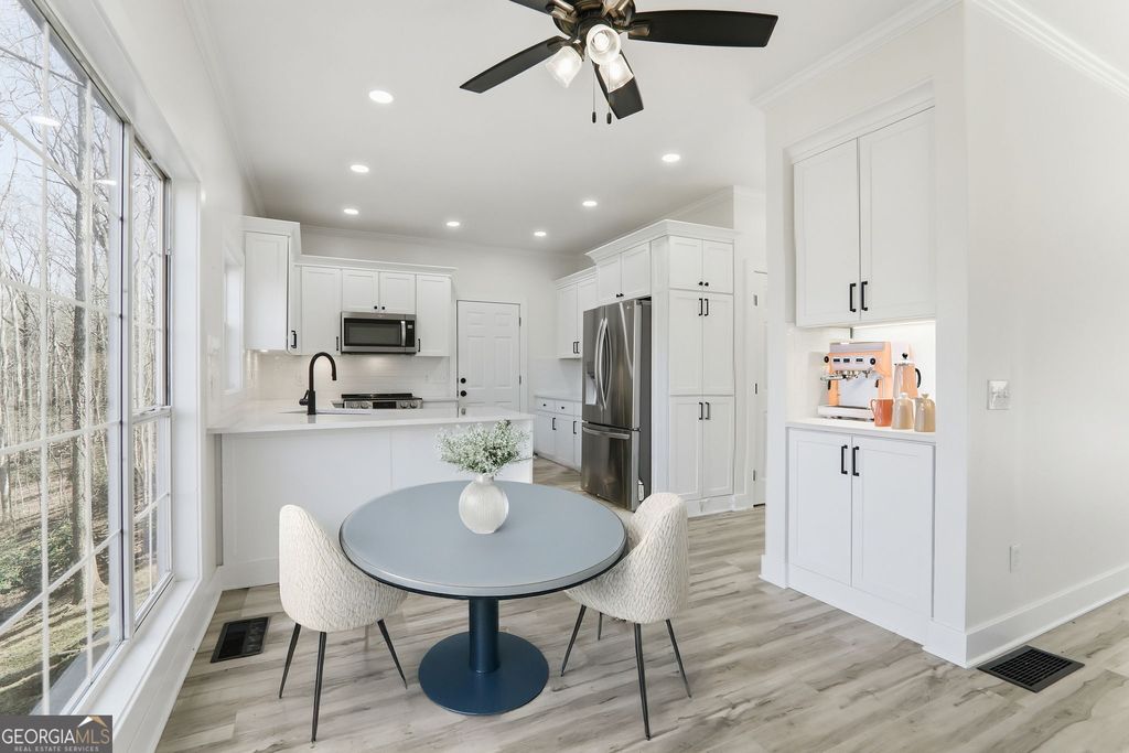 Photo of 5560 PILGRIM POINT Extension, Cumming, GA 30041 (MLS # 10767423)