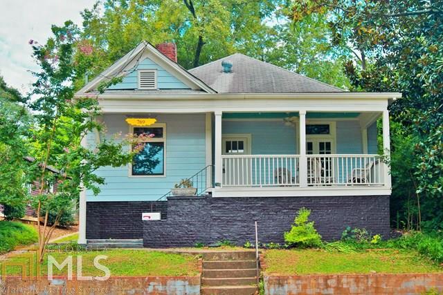 Located just 2 blocks from Grant Park, this 2BR/1BA classic style bungalow has a charm that is sure to make you fall in love. Inside you'll find a beautifully updated kitchen, hardwood floors throughout and a living room with double doors that open onto the relaxing front porch. Updated bathroom, storage shed out back...but the outdoor space is what truly puts this home over the edge. The back patio is awesome and perfect for kicking back after an afternoon stroll through the park. Perfect for anyone looking for that classic bungalow style in a prime location.