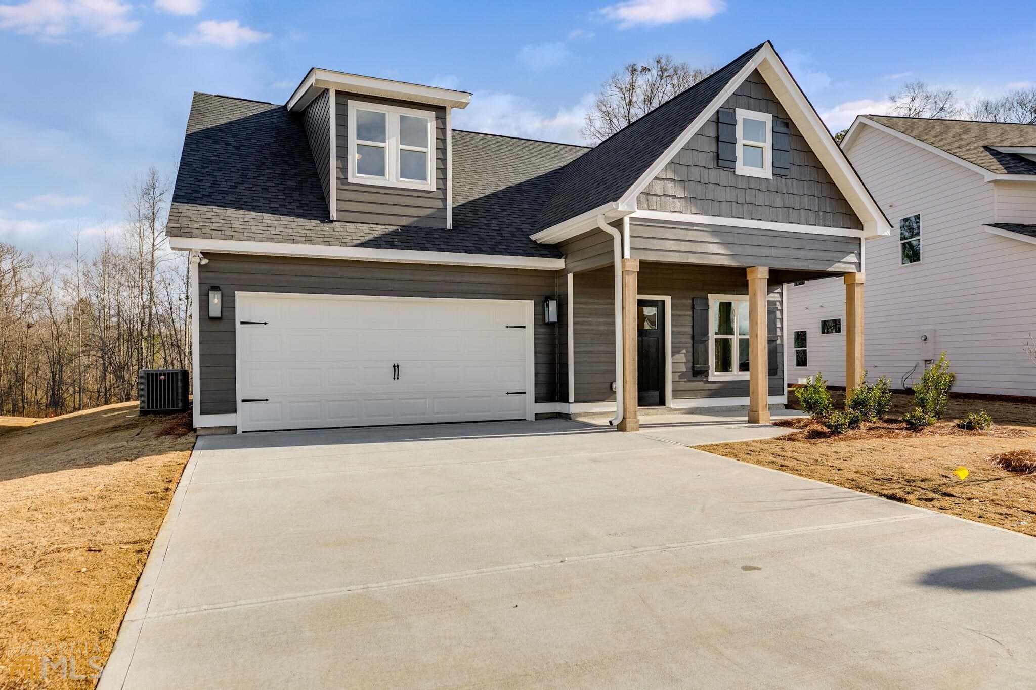 GET THEM WHILE THEY'RE HOT! Cedar Park is Carrollton City's NEWEST & HOTTEST In-Town N'hood. We adjoin the Green Belt and are conveniently located to all things Carrollton! The ROLLINS plan is a favorite for anyone that doesn't want a lot of house to upkeep, but to have plenty of room to live comfortably. Owner's Suite is on MAIN LEVEL with a spa-like bathroom featuring tiled shower, soaking tub and double vanity. The master closet is set up for a stacked washer/dryer. Main level also includes Family Room with wood floor, powder room, awesome kitchen with Island and Dining Area. Upstairs you'll find 2 secondary bedrooms, second laundry closet, secondary full tile bathroom and a BONUS ROOM! Covered back patio, concrete siding, zoned HVAC, electric log fireplace and designer details throughout! NEW HOME WARRANTY!