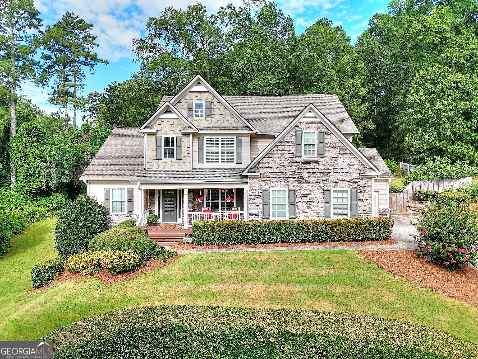 Welcome to this beautifully maintained 5-bedroom, 3.5-bath home located on a private .67-acre cul-de-sac lot with an above ground pool. This property features an open and functional floor plan with generous living areas, a large kitchen with ample storage and prep space, separate dining, and a main-level primary suite with en-suite bath including double vanities, soaking tub, and separate shower. Three additional spacious bedrooms are located upstairs and offer versatility for office or living space. Downstairs includes a dedicated media room with projector for movie nights along with high-top bar and sink that are perfect for entertaining. Also located downstairs is an additional full bedroom and bath with exterior entry. This home includes a large, fenced backyard with an above-ground pool, ideal for relaxing and summertime fun. Located in Loganville school district and convenient to local shopping and dining.