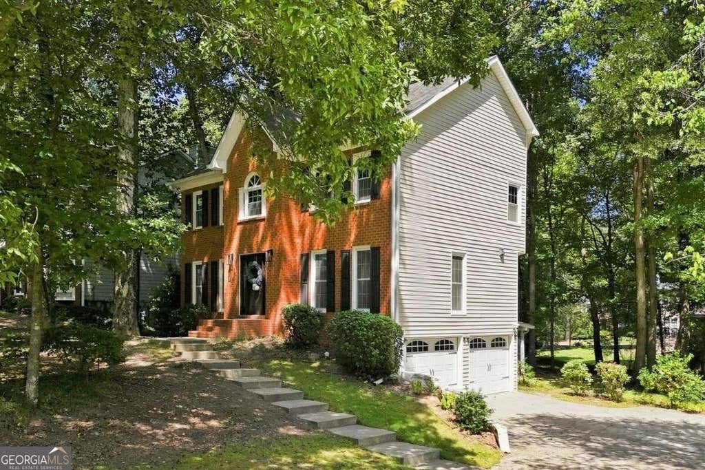 Photo of 1240 Wynford Colony SW, Marietta, GA 30064 (MLS # 10829680)