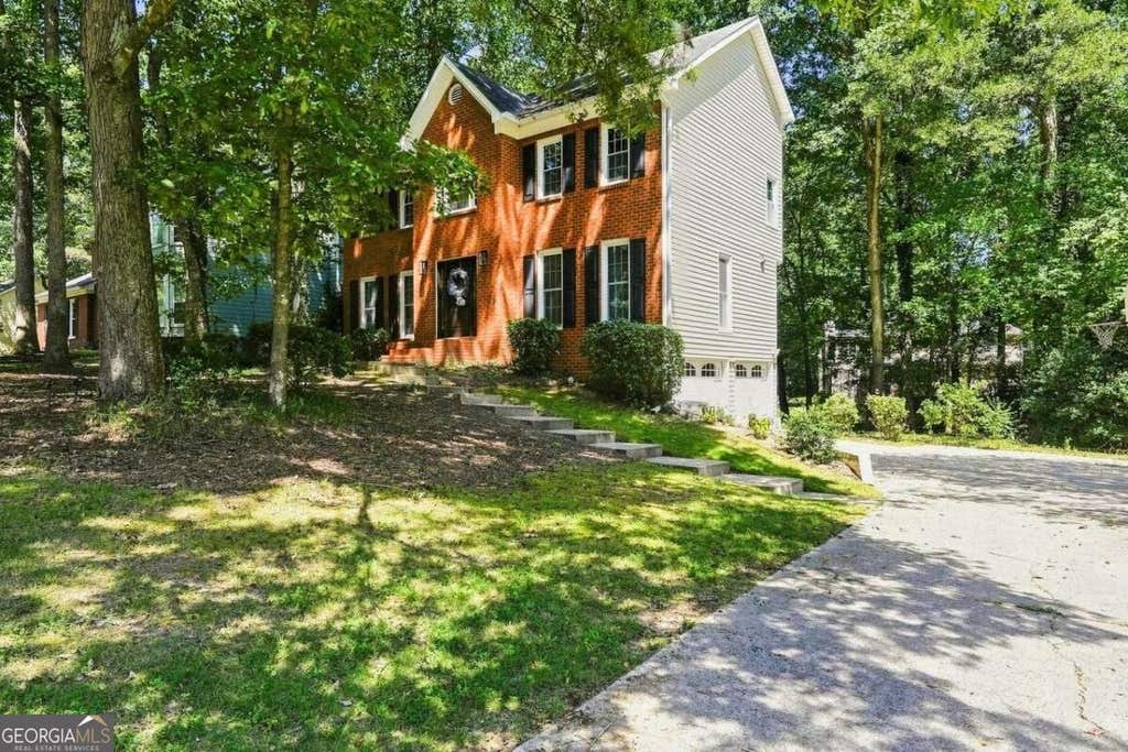 Photo of 1240 Wynford Colony SW, Marietta, GA 30064 (MLS # 10829680)