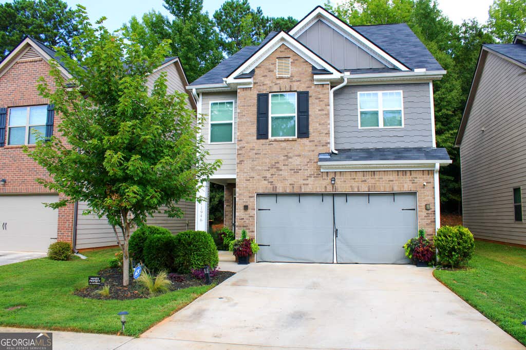 Photo of 11946 Lovejoy Crossing Way, Hampton, GA 30228 (MLS # 10824397)