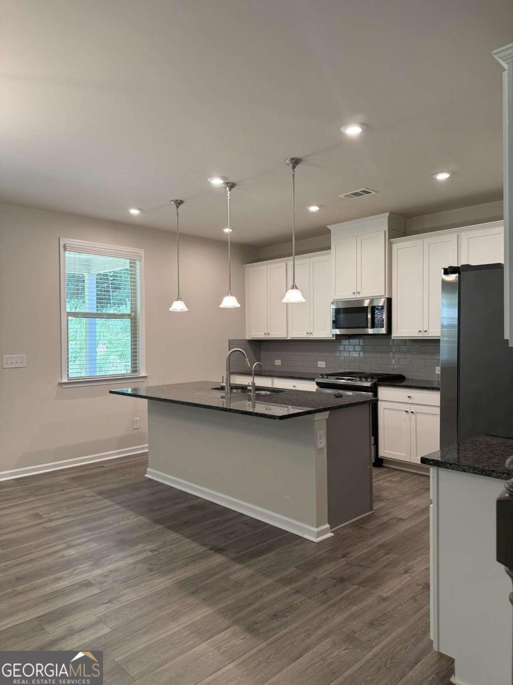 Photo of 638 Saffron Boulevard, Lawrenceville, GA 30045 (MLS # 10802675)