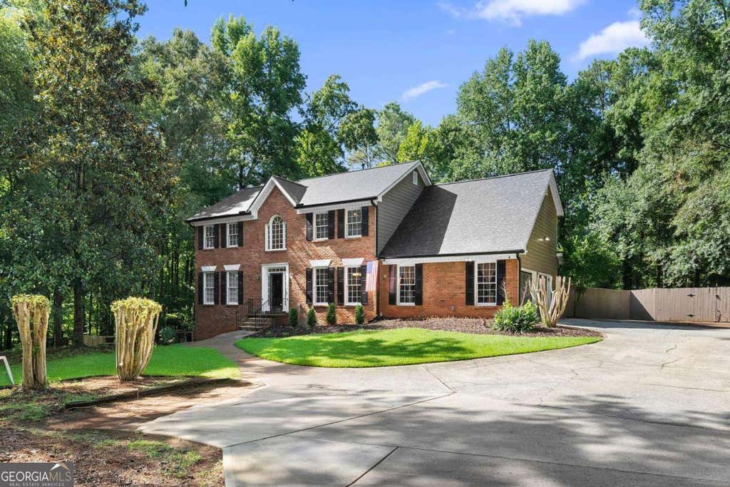 Photo of 10560 Haynes Bridge Road, Alpharetta, GA 30022 (MLS # 10826567)