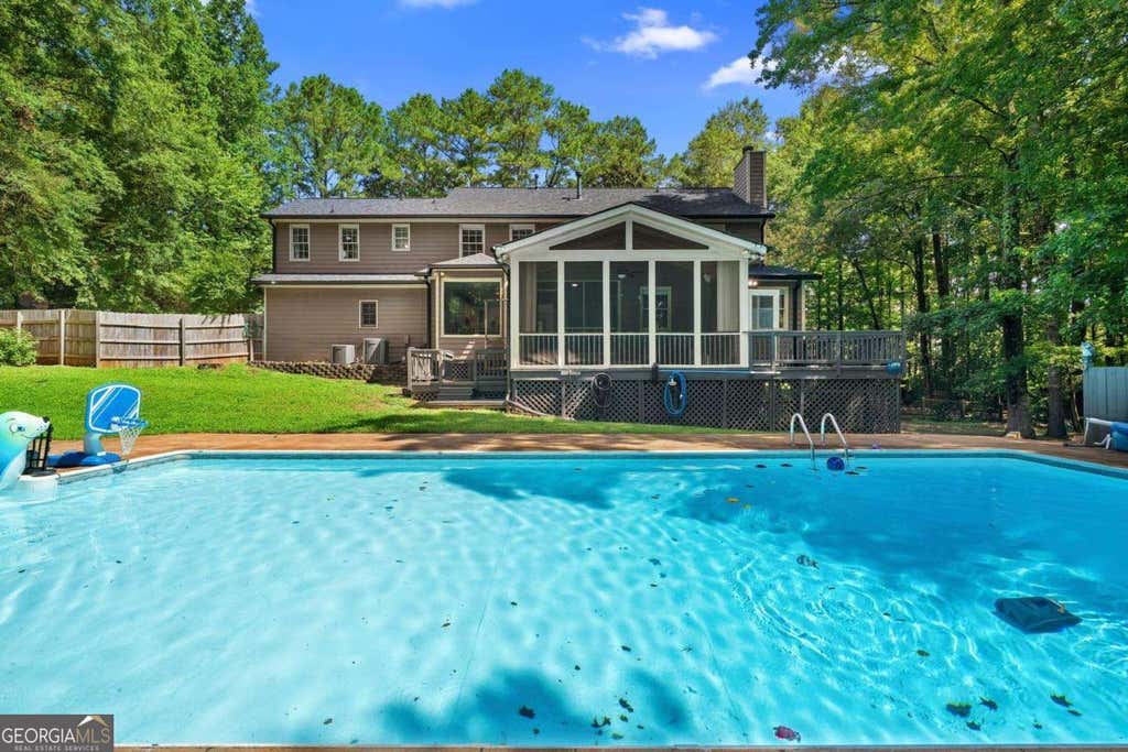Photo of 10560 Haynes Bridge Road, Alpharetta, GA 30022 (MLS # 10826567)
