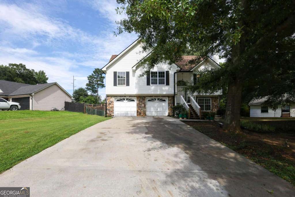 Photo of 75 Woodland Ridge Circle, Covington, GA 30016 (MLS # 10826887)