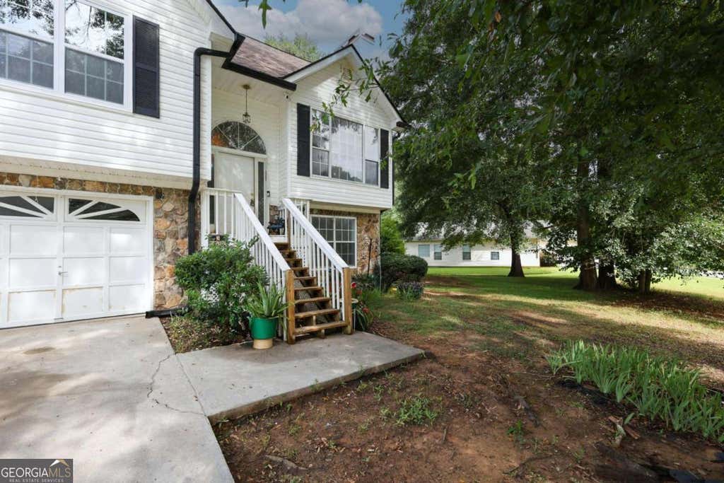Photo of 75 Woodland Ridge Circle, Covington, GA 30016 (MLS # 10826887)