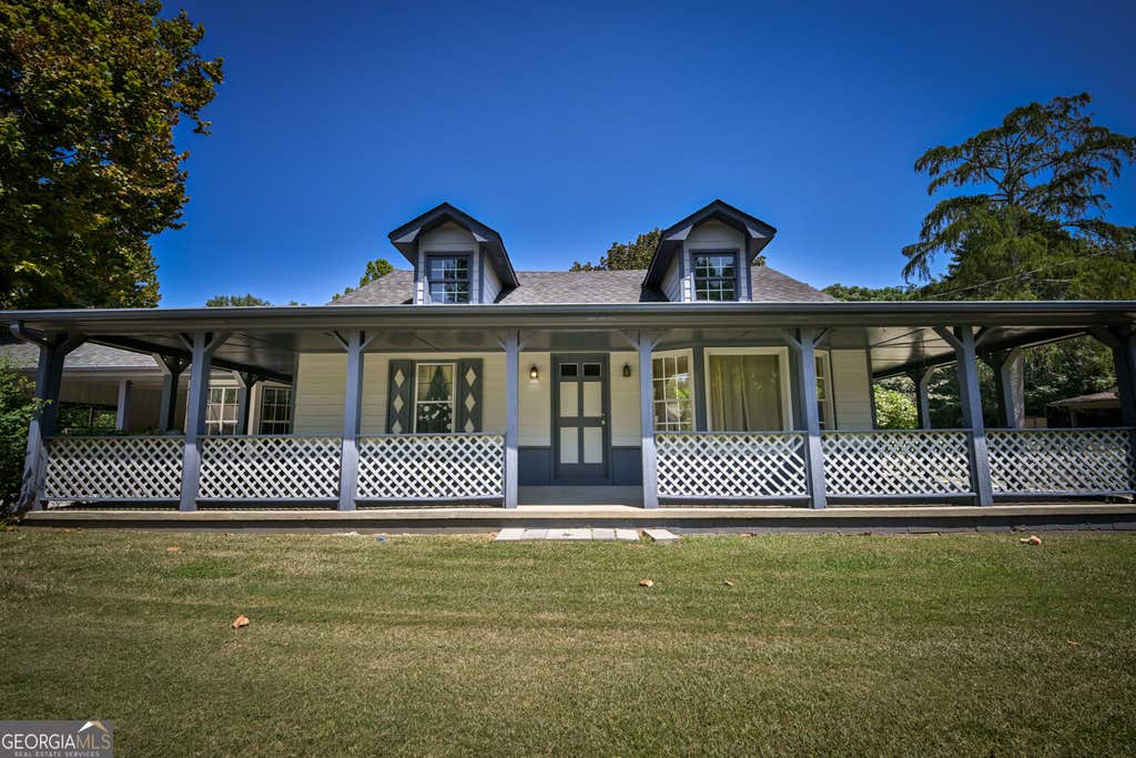 Photo of 2144 Boar Tusk Road NE, Conyers, GA 30012 (MLS # 10833393)