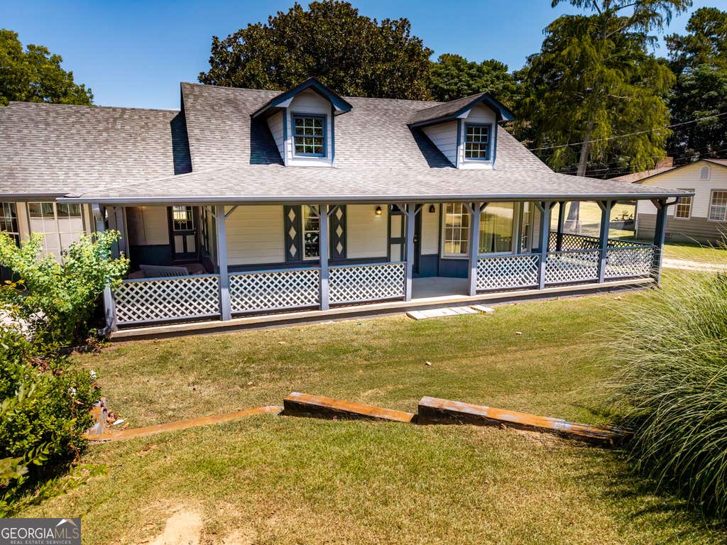 Photo of 2144 Boar Tusk Road NE, Conyers, GA 30012 (MLS # 10833393)