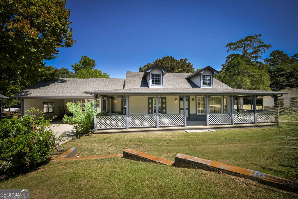 Photo of 2144 Boar Tusk Road NE, Conyers, GA 30012 (MLS # 10833393)
