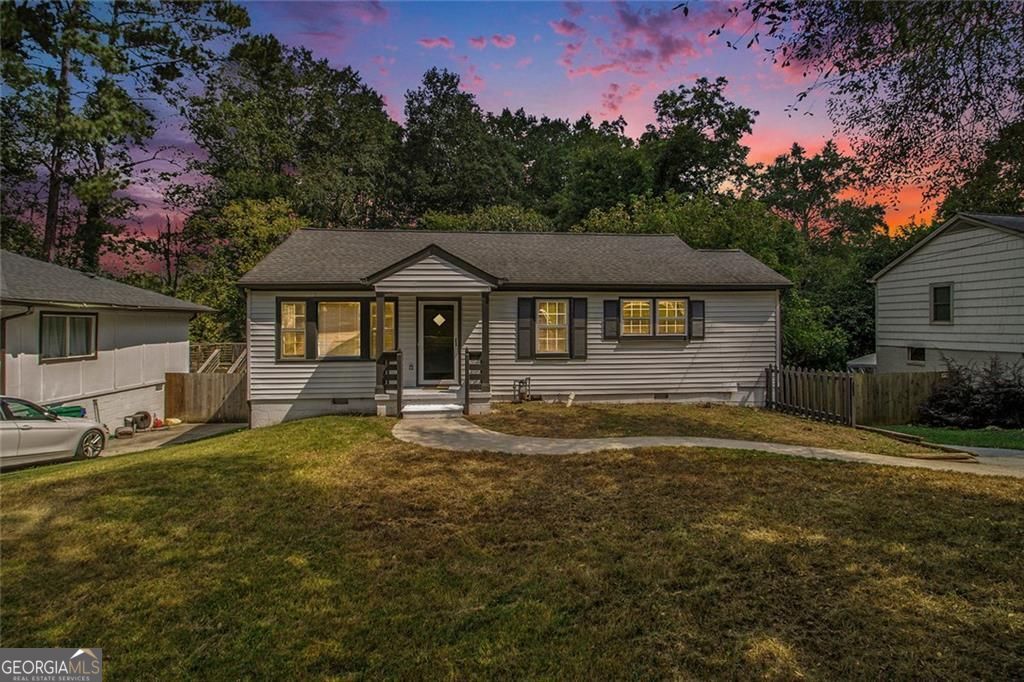 ***WOW!!*** Welcome to 1884 Meadow Lane, a beautifully renovated 2-bedroom, 1-bathroom home in the heart of Decatur, Georgia. This MOVE-IN READY PROPERTY combines modern upgrades with everyday convenience, making it a fantastic opportunity for homeowners and investors alike. Inside, you'll find brand-new LVP flooring throughout, new windows, fresh paint, and updated fixtures that give the home a clean and stylish feel. The kitchen has been thoughtfully redesigned with sleek granite countertops, freshly painted white cabinets, and new stainless-steel appliances-perfect for both everyday meals and entertaining guests. The SPACIOUS BEDROOMS offer comfort and natural light, while the updated bathroom features modern finishes. One standout feature of this home is the massive 700-SQUARE-FOOT CRAWL SPACE, ideal for extra storage, tools, or hobby space. Step outside to enjoy a large, PRIVATE BACKYARD WITH NO NEIGHBORS BEHIND YOU-perfect for relaxing, gardening, or entertaining. The home also comes with the added benefit of NO HOA. Located just minutes from shopping, dining, entertainment, and easy interstate access, this home provides both comfort and convenience. The neighborhood is welcoming with very nice neighbors, making it an excellent place to call home. Don't miss your chance to own this turnkey property in one of Decatur's most convenient locations!
