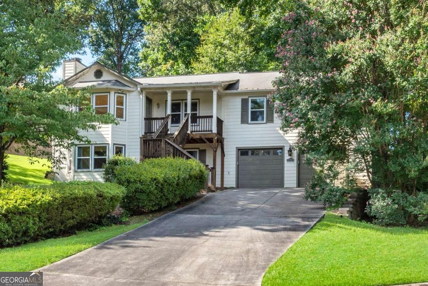 Do not miss this incredible opportunity in the Walton School District! Heritage Trace offers the best of East Cobb living. This raised ranch on a basement includes a full in-law/teen suite and is priced to reflect the cost of a kitchen remodel. The main level features an open floor plan with hardwood and luxury vinyl throughout, oversized rooms, and abundant natural light. Secondary bedrooms include large closets and new windows. The kitchen overlooks a large, level, fenced backyard--perfect for family activities and entertaining. The finished basement offers an above-grade living room, bedroom, junior kitchen, half bath, and plenty of storage, making it ideal for guests, teens, or extended family. This home combines space, flexibility, and location. Schedule your showing today--this one will not last!