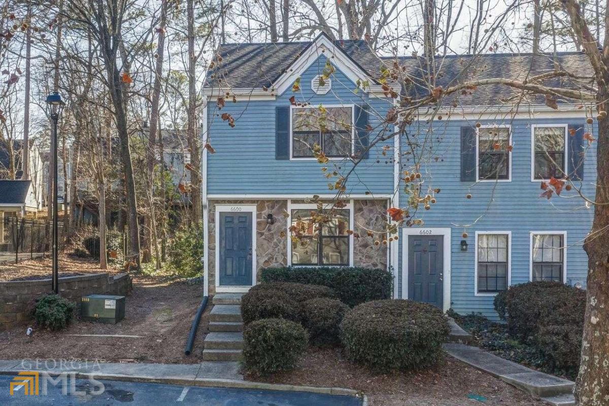 Fantastic and newly renovated end unit in desirable Peachtree Corners. Freshly painted with the bright and inviting Sherwin Williams Snowbound, this home has been thoughtfully designed with a black and white theme so you can blend your color palettes into the space effortlessly. New flooring through-out including waterproof Luxury Plank Vinyl and neutral carpet upstairs. Kitchen features include Ice White quartz countertops, stainless steel appliances, gas range, deep SS sink with new faucet and white cabinets. The bathrooms have been uniformly updated with quartz countertops, new sinks, light and bath fixtures. Autumn Trace is an established community and is centrally located in close proximity to Atlanta and is only minutes from the Forum, Town Center, Historic Norcross, and major highways including I-285, I-85 and GA 400. HOA includes exterior maintenance, landscaping, trash, pool and tennis court.
