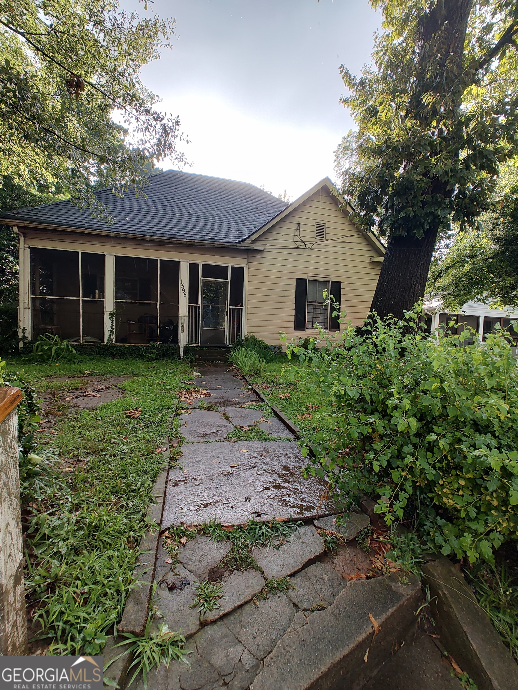 Attention investors and renovators! Rehab Opportunity - 1920s Home with Great Potential This classic 1920-built home is brimming with potential and waiting for your vision. Located in a rapidly developing area, this is the perfect opportunity for a fix-and-flip, long-term rental, or even a full restoration project. The structure needs a full rehab, but the layout and lot provide endless possibilities. Restore its historic charm or modernize it to today's standards.