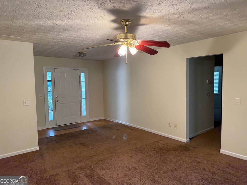 Photo of 140 Trinity Drive, Covington, GA 30016 (MLS # 10825693)