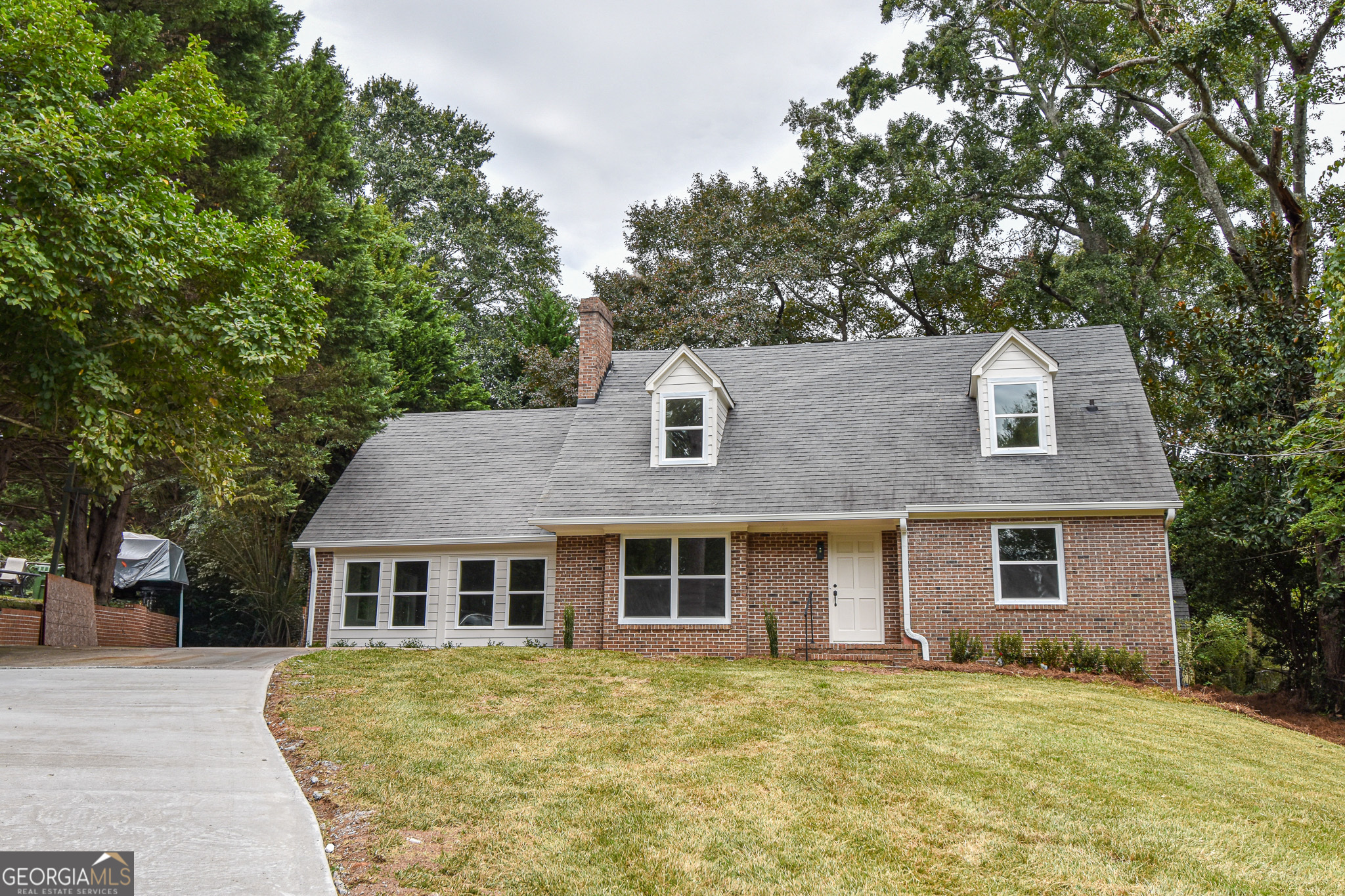 Classic Charm Meets Modern Living in This Beautiful Brick Home Welcome home to this newly renovated traditional brick beauty in one of the area's most sought-after locations! From the moment you step inside, you'll fall in love with the blend of timeless character and thoughtful updates throughout. The owner's suite on the main level is a true retreat, complete with a custom-designed walk-in closet and a spa-like bath featuring double vanities and a sleek tiled shower. Restored hardwoods carry warmth and character through the main level, setting the tone for comfortable, elegant living. The heart of the home is the spacious kitchen and dining area, outfitted with stainless steel appliances and a welcoming bar for casual meals or entertaining guests. Just steps away, you'll find a cozy back porch overlooking the freshly landscaped yard-a perfect spot to relax at the end of the day. Upstairs offers two generously sized bedrooms, a full bath, and a huge bonus room with endless possibilities-whether it's a playroom, home office, or creative studio. The lower-level bonus room provides even more space to spread out, making it ideal for a media room, gym, or recreation area. With its inviting layout, stylish updates, and unbeatable location, this home is move-in ready and waiting for you to make it your own.