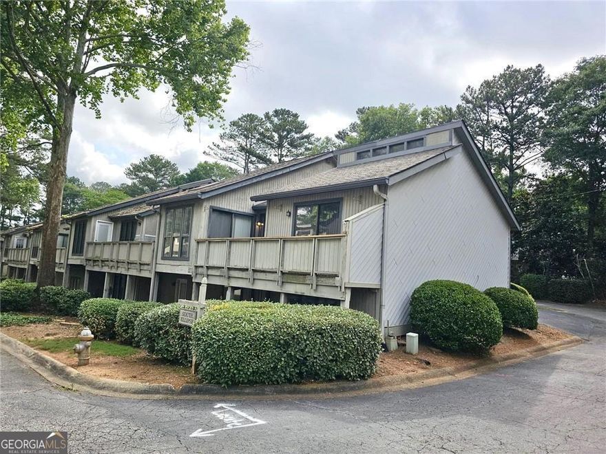 Fully renovated townhouse in a sought after location near the interstection of Lower roswell - Johnson Ferry road. This unique floor plan has vaulted ceilings on the main floor. Brand new kitchen with open access to the living area and to the outside deck. The formal dining area is next to the kitchen.There are two living rooms on this house, each floor has a living room with fireplace. Master bedroom is upstairs and it has a brand new bathroom that connects to the hallway. Downstairs area has a large living area and a bedroom with full bath with outside access. The powder room is on the lower level. The subdivision is going through a major renovation, which will see property values go up very soon.   There is no seller's disclosure. This is a flip. Listing agent is a principal for the entity that owns the property and will sign on its behalf. Closing with Weissman Law firm.