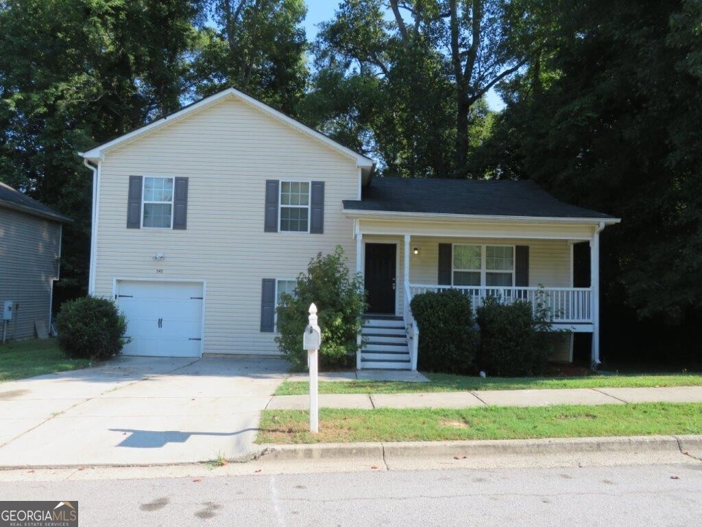 Beautiful home in Bridgeport Park! Covered, rocking chair front porch! Spacious living room with vaulted ceiling! Separate dining room! Kitchen features stained cabinets, stone counters, and stainless steel appliances! Primary bedroom features tray ceiling, walk-in closet, and private bathroom with double vanity! Two spacious secondary bedrooms share another full bathroom! Additional bonus bedroom on basement level! Rear deck overlooks backyard! A must see! Don't miss out!