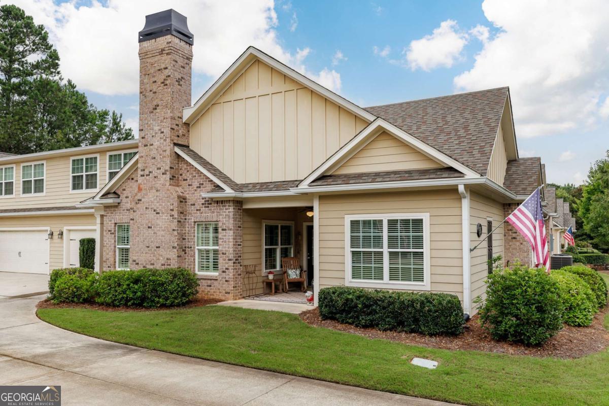 Discover comfort, convenience, and community at its finest in this beautifully maintained home, ideally located in the sought-after Creekside Cottages-a quiet, gated neighborhood designed exclusively for active adults 55 and better. Enjoy scenic sidewalks, lush green spaces, and a serene atmosphere just steps from the clubhouse and private pool. This one-level, fully ADA-compliant home features 3 spacious bedrooms and 2 full bathrooms, thoughtfully designed for ease of movement and modern living. The vaulted great room welcomes you with a warm gas fireplace framed in elegant marble and flows seamlessly into a gourmet kitchen-complete with granite countertops, a 6-burner gas range, custom pull-out cabinetry, and a large island perfect for entertaining or casual meals. The primary suite is a peaceful retreat, featuring a completely renovated bathroom with a frameless roll-in shower for both luxury and accessibility. While the original tub was removed, the space and plumbing remain, allowing easy installation of a soaking tub if desired. Convenient touches continue with a large laundry room, storage closet and everyday entry through the attached two-car garage. A wide staircase leads to an unfinished attic, already plumbed for a full bath-perfect for future expansion or guest quarters. Additional highlights include: Recirculating water heater for instant hot water, Prime location just steps from the community clubhouse and pool, Meticulously maintained inside and out. Whether youre looking to downsize without sacrificing style or embrace a low-maintenance lifestyle close to neighbors and amenities, this home offers the perfect balance of comfort and quality.