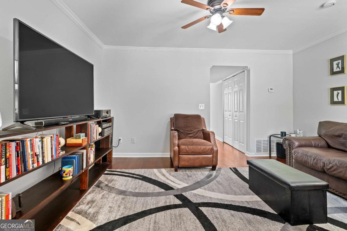 This charming and meticulously maintained 2-story condo in Alpharetta offers a perfect blend of style and comfort, featuring 2 bedrooms and 1 bath, and is ideally located less than 1 mile from the vibrant Avalon, with its fantastic shopping and dining options. The updated kitchen is a culinary delight, boasting a gas burner stove and exquisite custom stone countertops, while the beautifully renovated bathroom adds a touch of modern elegance. Unique to this condo, the owners have thoughtfully installed stackable washer/dryer units, allowing for convenient in-home laundry capabilities that many others in the community lack. Enjoy outdoor relaxation on the inviting rear patio, complemented by a newer HVAC system for year-round comfort and added outdoor storage. Nestled within a highly-rated school district that includes Alpharetta High School, Webb Bridge Middle School, and New Prospect Elementary School, this home represents exceptional value. The community is brimming with appealing dining options, such as Ocean & Acre for fresh seafood, Bocado Burger for gourmet burgers, and Il Bacco for authentic Italian cuisine. Additionally, the nearby Ameris Bank Amphitheatre showcases a star-studded concert lineup, enhancing the lively and vibrant community atmosphere. With so much to offer, this outstanding condo is a must-see and won't last long!
