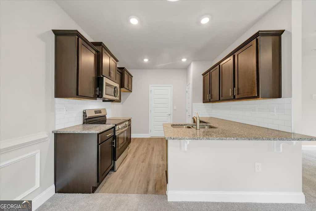 Photo of 313 Melanie Court #LOT 26, Bowdon, GA 30108 (MLS # 10817598)