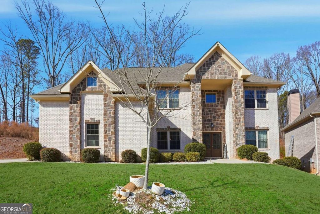 Photo of 5663 Eternal Drive, Atlanta, GA 30349 (MLS # 10722314)