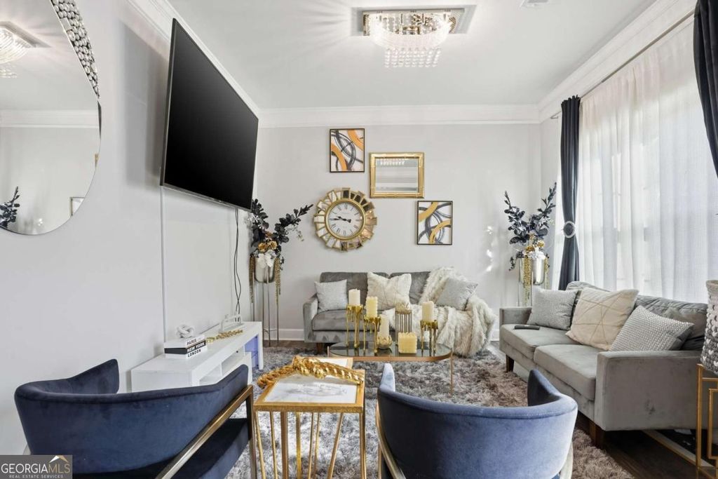 Photo of 5663 Eternal Drive, Atlanta, GA 30349 (MLS # 10722314)