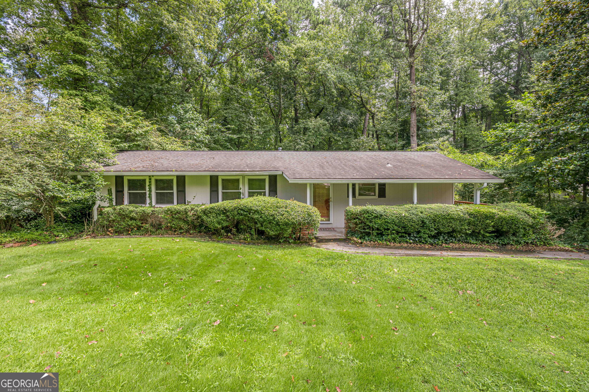 Rare opportunity! Updated ranch in a desired area of Atlanta/Chamblee. Here is a 3 bedroom/2 full walk-in shower bath which also includes a finished basement also with a full bath. This convenient beauty is also nestled on a wooded lot enhanced with a calming brook to complete the setting. Seclusion living with all the amenities close by. If this is not enough to entice your desires - the home also includes many updates such as granite countertops with peninsula breakfast bar, new LVP flooring throughout the main floor, counter depth refrigerator, granite counters in the bathrooms, just to name a few. The updates continue with the "out of site" items such as improved attic insulation, dual fuel heat pump (instant heat, how nice), new water heater with new expansion tank. All appreciated upgrades. Area conveniences are Northside Hospital of Atlanta, Perimeter Center, Murphey Candler Parker, Blackburn Park in North Brookhaven and Keswick Park just to the south. 3671 Cold Spring Lane is a rare gem, nestled in the lush woods of the active and vibrant Atlanta. Hurry! This gem won't last long!