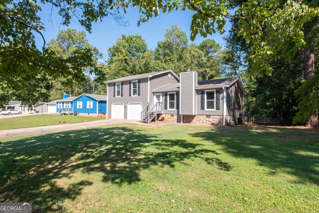 Photo of 1119 Blazing Ridge, Lawrenceville, GA 30046 (MLS # 10849468)