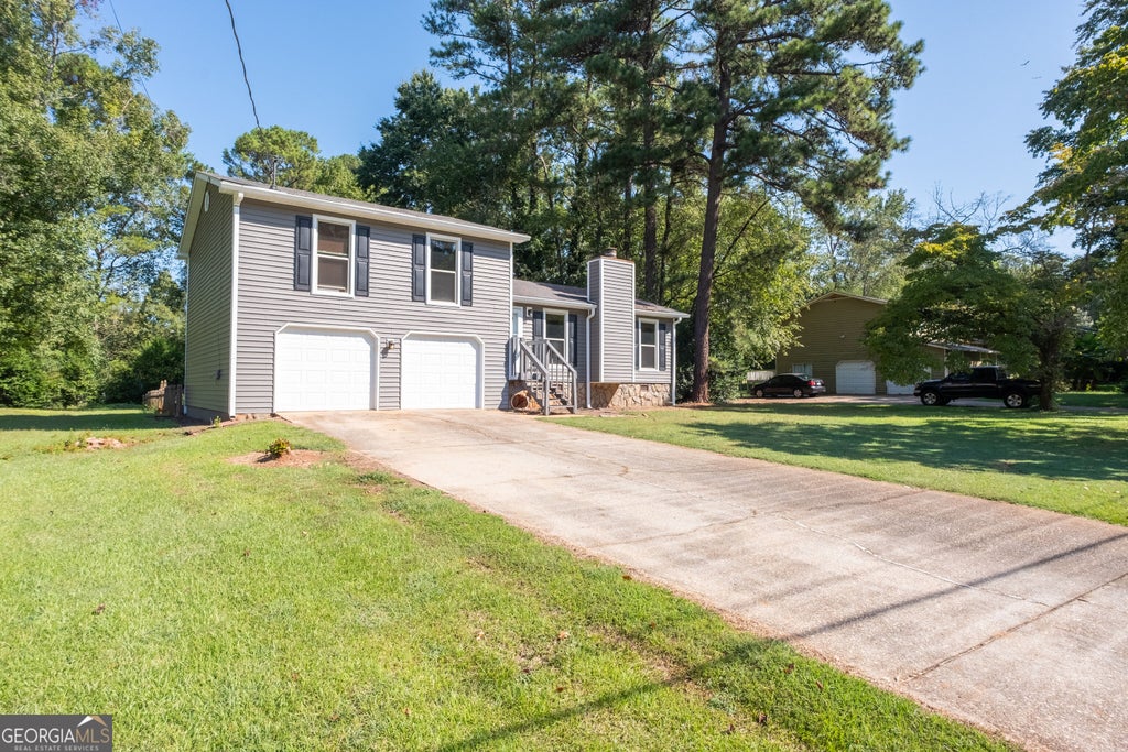 Photo of 1119 Blazing Ridge, Lawrenceville, GA 30046 (MLS # 10849468)