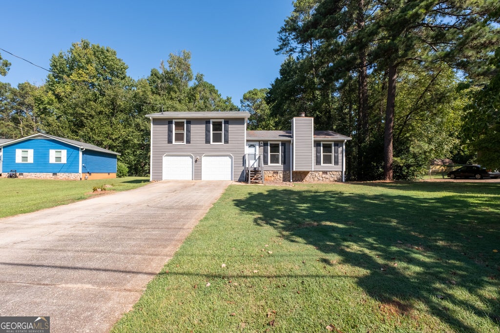 Photo of 1119 Blazing Ridge, Lawrenceville, GA 30046 (MLS # 10849468)