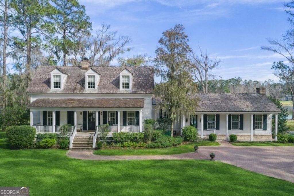 Photo of 437 Belted Kingfisher Lane, Richmond Hill, GA 31324 (MLS # 10679522)