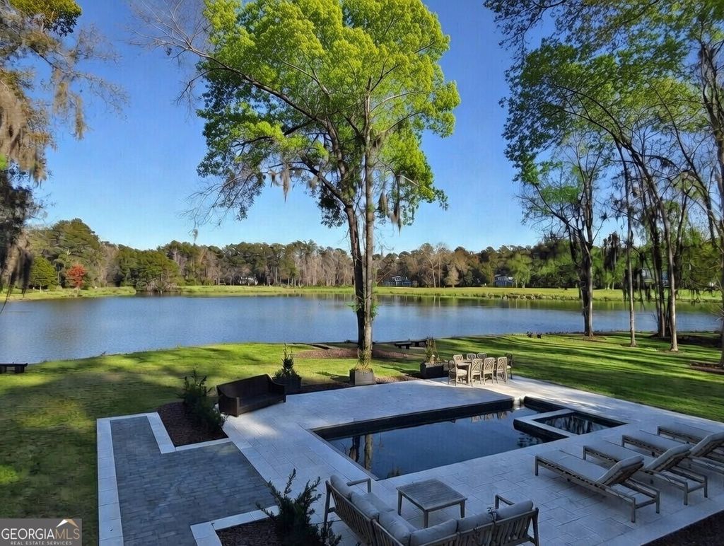 Photo of 437 Belted Kingfisher Lane, Richmond Hill, GA 31324 (MLS # 10679522)