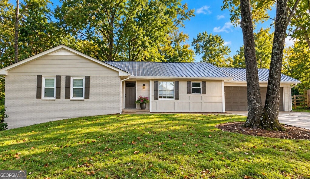 Photo of 390 Tidwell Circle, Alpharetta, GA 30004 (MLS # 10873815)