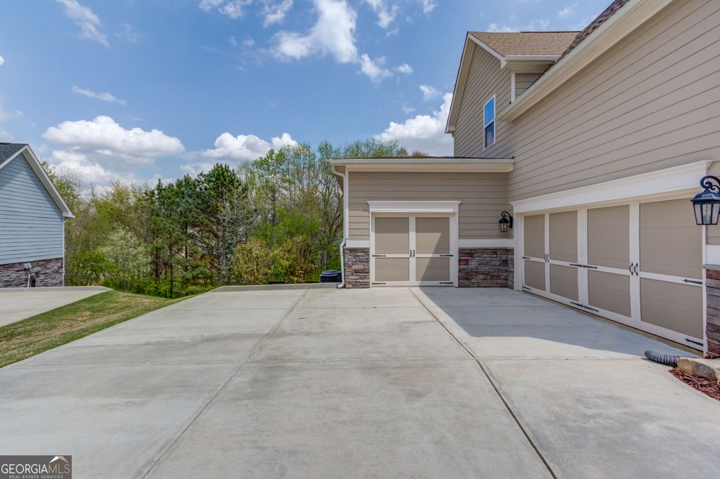 Photo of 8760 Mica Creek, Ball Ground, GA 30107 (MLS # 10724810)