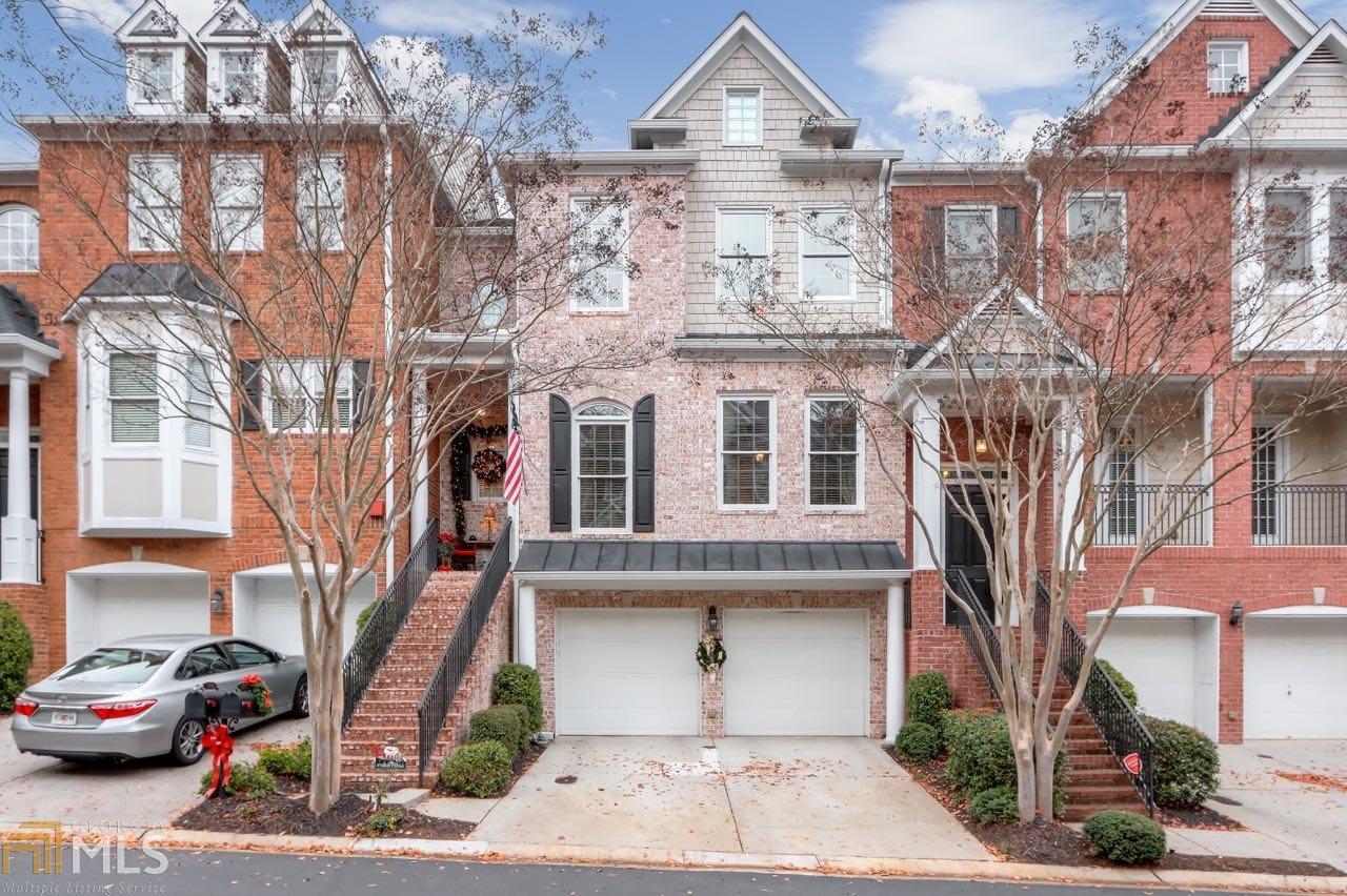Gorgeous, Ashton Woods Townhome near The Battery, Highways, Restaurants, Walking Trails & More. A Meticulously Maintained, Open Floor Plan Home Perfect for Entertaining with Views into the Living Room and Keeping Room. Large Chef's kitchen opens to Dining Room, Keeping Room & Main Level Deck/ Sunroom. Enclosed Sunroom with Custom Windows to Adjust to your Liking. Oversized Master Suite w/Sitting Room & Upper Level Deck.Master Bath w/Soaking Tub & Walk-in closet w/California Closet System. So many additional Upgrades Include: High-end Chandeliers, Granite in Guest Bathrooms, Screened in Porch Newly installed in the Basement, New Upper Deck Windows, New Roof, Iron Railings on Staircases, and Custom Shelving in the Garage. Finished terrace level features Large Bonus Room, Bedroom, Full bath, Additional Living Room & Covered Patio. Plus low Cobb taxes.