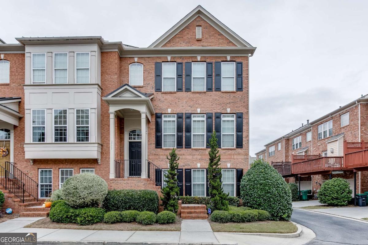 Now available for lease starting September 1st, this stunning all-brick corner lot townhome is located in the highly sought-after Vinings area. This spacious and elegant residence features a two-car garage with abundant storage and offers a perfect blend of luxury, functionality, and location. The main level boasts a two-story foyer, gleaming hardwood floors, and an inviting gas fireplace. The large kitchen is a chef's dream, complete with a generous island, granite countertops, a tiled backsplash, and a GE stainless steel appliance package, all open to the dining room-ideal for entertaining. A large private balcony extends the living space and offers a perfect place to unwind. Upstairs, you'll find two spacious bedrooms, each with custom walk-in closets and en-suite bathrooms. The primary bath includes dual vanities with granite countertops, a jetted soaking tub, and a separate tiled shower. The laundry area is conveniently located upstairs and includes a washer and dryer. The terrace level provides a large third bedroom and a full bath, perfect for guests, a home office, or additional living space. Situated just minutes from The Battery, Truist Park, Vinings Jubilee, and some of Atlanta's premier private schools-including Trinity, Westminster, Lovett, and Pace Academy-this townhome offers exceptional access to everything the area has to offer. With its premium location, upscale finishes, and thoughtful layout, this home is a rare leasing opportunity in one of the city's most desirable neighborhoods. Please No Pets, Thank you!