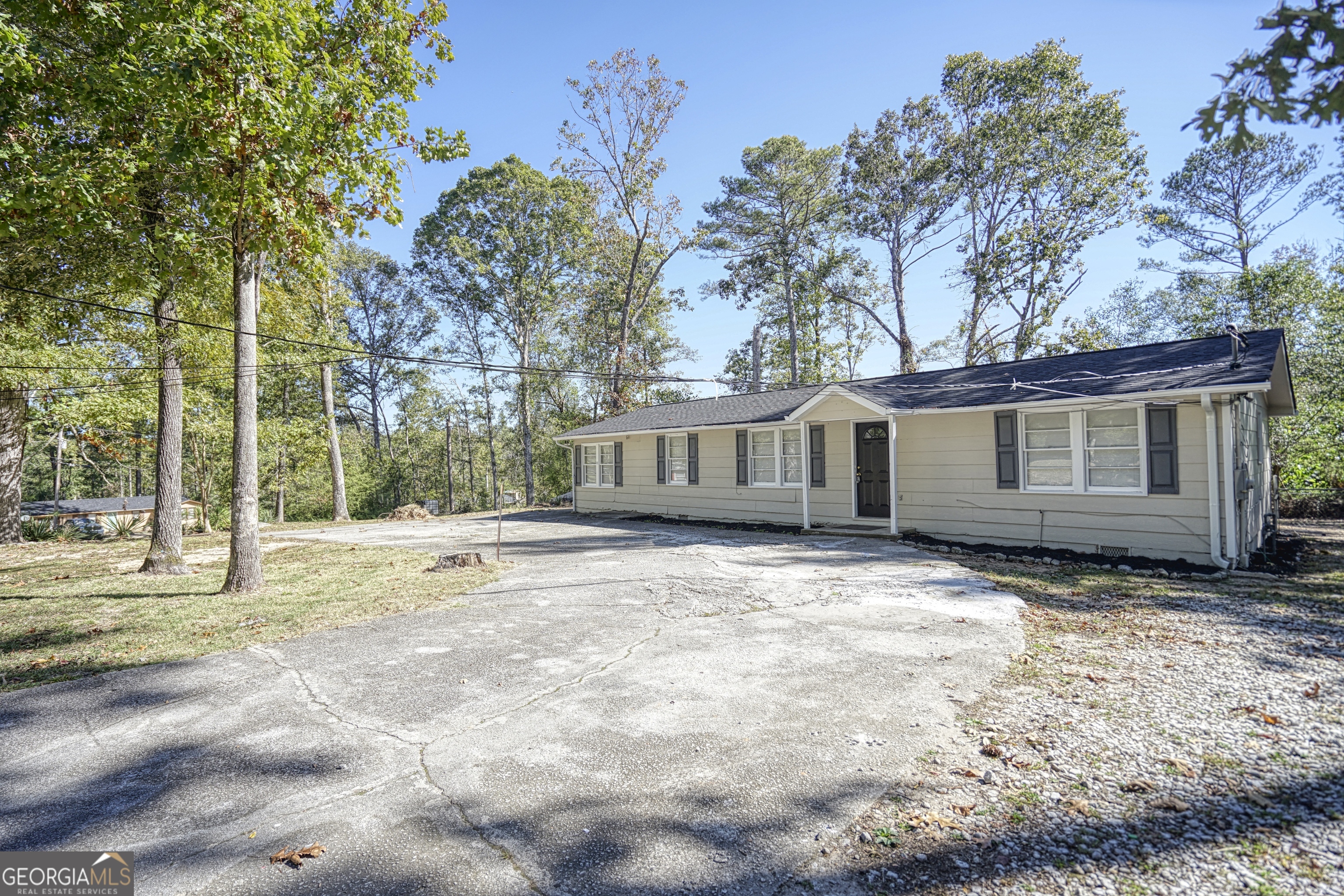 This charming 4-bedroom, 2-bathroom house offers comfort, space, and a peaceful setting - nestled on a generous 0.45-acre lot in a quiet, established neighborhood. Freshly painted throughout and move-in ready, this home is perfect for families or anyone seeking suburban tranquility. Enjoy easy access to local shops, schools, and major highways - offering the ideal balance of convenience and calm living.