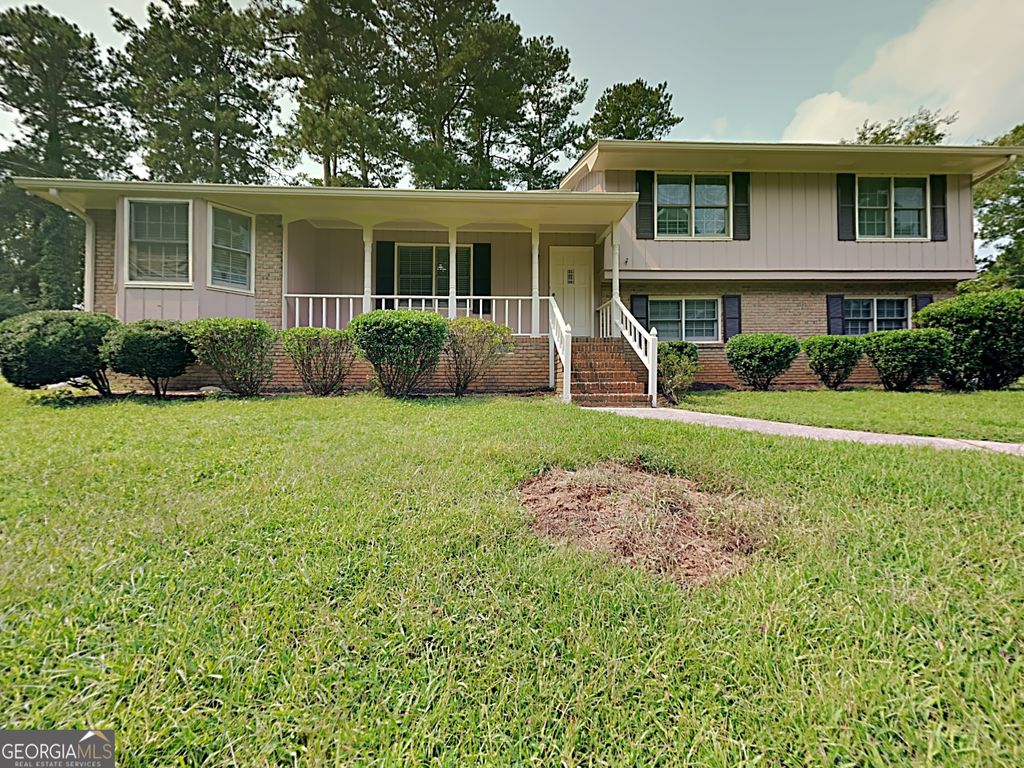 Photo of 551 Village Green Court SW, Lilburn, GA 30047 (MLS # 10705345)