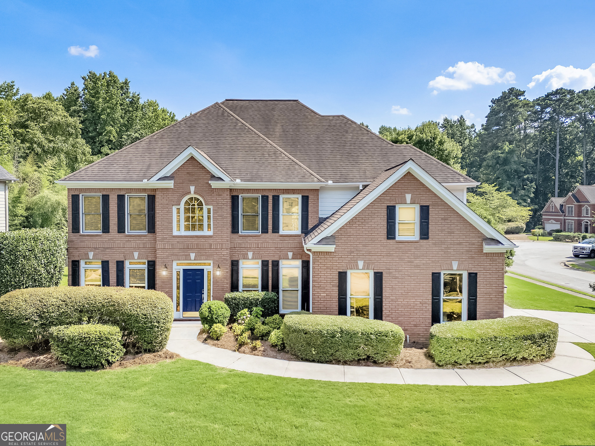 Open House: 2 - 4 PM on Saturday, 6/28 & Sunday, 6/29. Located in the sought-after Murdock/Dodgen/Pope school district, this beautiful home sits on a large corner lot off a cul-de-sac, offering privacy and space. The very open and functional floor plan features a soaring two-story family room filled with natural light. The kitchen boasts granite countertops, a brand-new gas cooktop with a vented hood, and opens to the bright breakfast area. Enjoy brand-new engineered hardwood flooring throughout the main level and stairs, along with new carpet upstairs. A guest bedroom and full bath on the main floor provide flexible space for visitors or a home office. Fresh interior and exterior paint give the home a clean and refreshed feel. Upstairs, the spacious owner's suite features a deep tray ceiling, a sitting area, a jetted tub, a walk-in shower, and a generous walk-in closet. All three secondary bedrooms are nice-sized with high ceilings; one has a private en-suite bath. New toilets, mirrors and fixtures in the bathrooms. The fully fenced, flat backyard is ideal for play and relaxation, with an expansive concrete patio perfect for basketball, summer gatherings, or low-maintenance outdoor living. Low HOA fees. Optional swim/tennis memberships are available at the neighboring community or at East Cobb Swim & Tennis, less than 5 minutes away. Don't miss this opportunity-schedule your showing today!